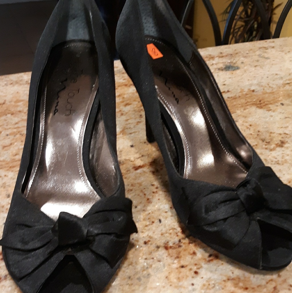The Touch Of Nina Black Heels